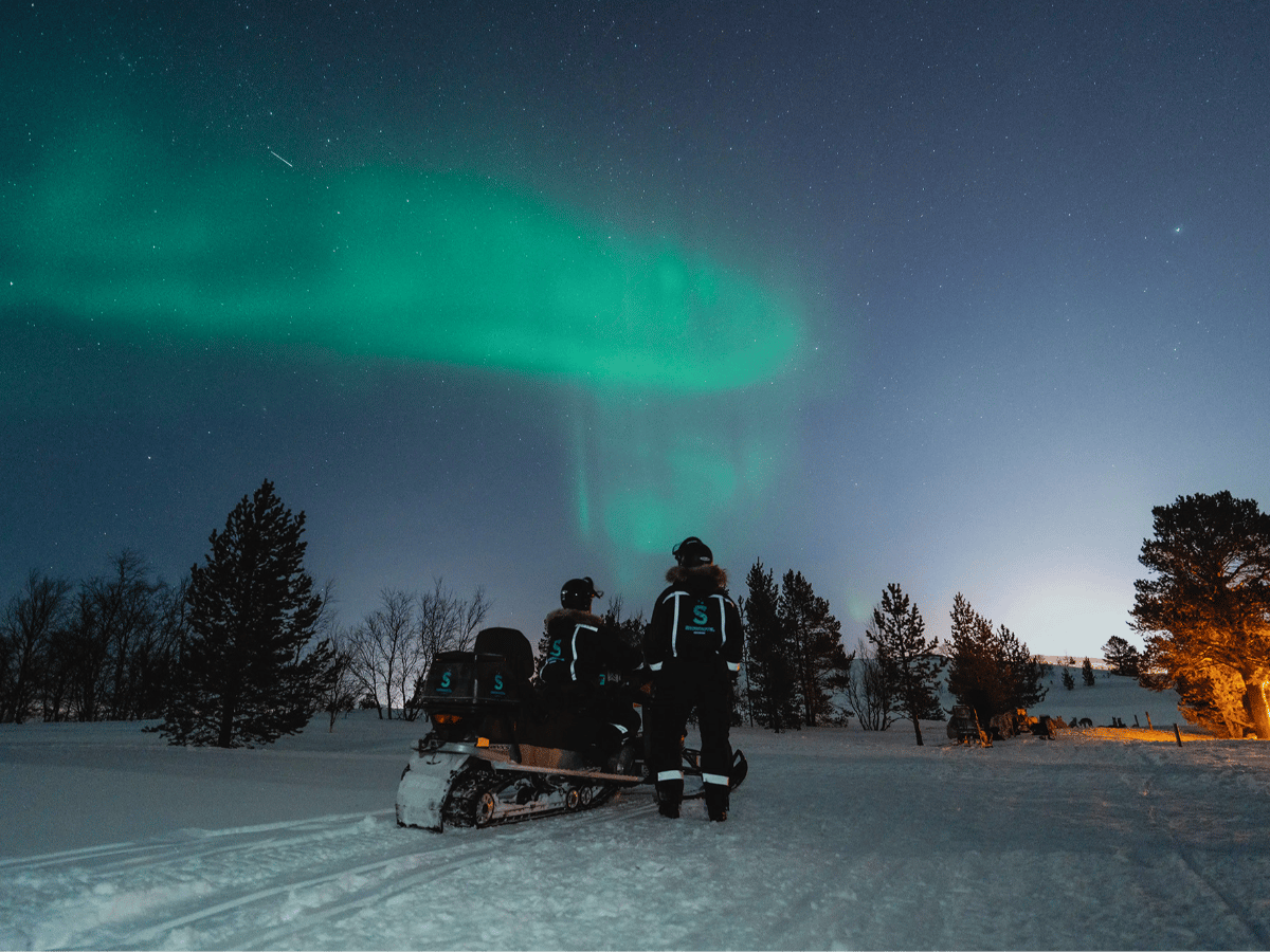 Hunting the Northern Lights by Snowmobile